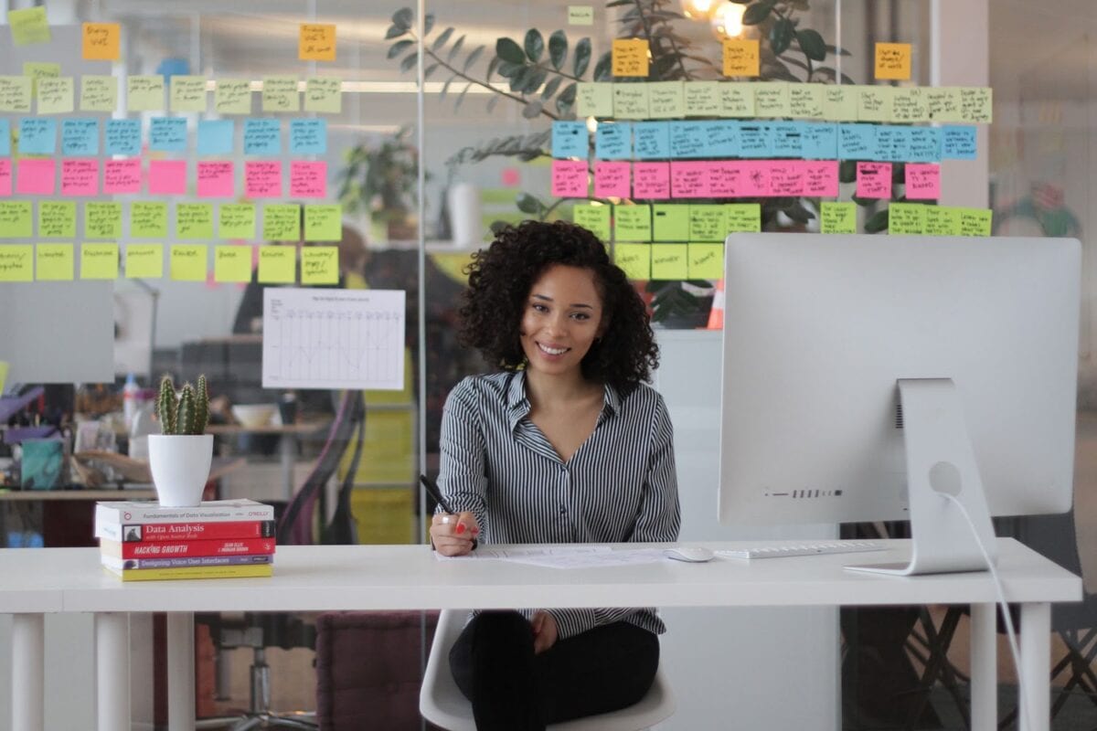 A CareerFoundry student sits in front of a computer